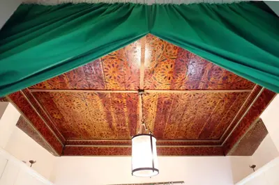 a ceiling of a building with a green canopy at Dar Zerhoune in Moulay Idriss Zerhoun