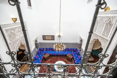 an overhead view of a mosque with a chandelier at Riad Mounana fez 13th century luxury palace& spa in Fès