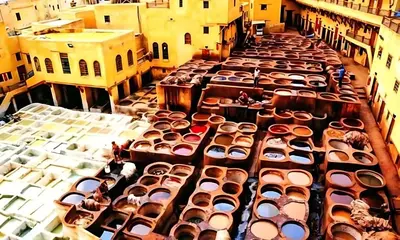 a bunch of toilets are lined up on a street at Riad Mounana fez 13th century luxury palace& spa in Fès