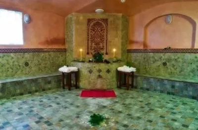a room with two chairs and a table in a building at Chems Du Lac Bin El Ouidane in Bine el Ouidane