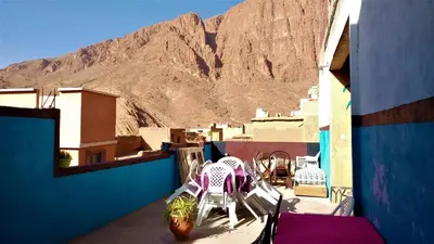 a balcony with a view of a mountain at Dounia Hostel in Tinerhir