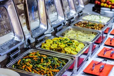 a bunch of trays of food on a table at Hotel La Perle du Sud in Ouarzazate