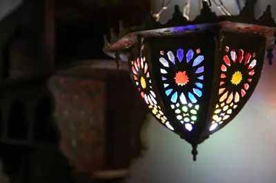 a stained glass lamp with flowers on it at Dar El Yasmine in Fès
