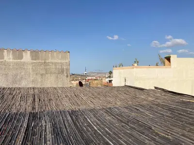 a tile roof on top of a building at Dar Zin in Fès