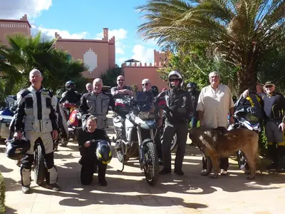 a group of people are posing for a picture at Les Tourmalines in Ouarzazate