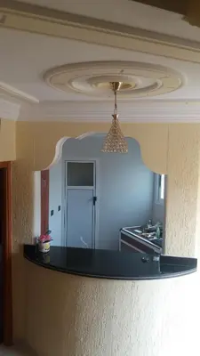 a kitchen with a ceiling with a mirror above a counter at Hotel Palace Zaida in Zaida