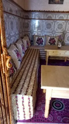a small room with a bench and a table at Hotel Palace Zaida in Zaida