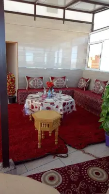a living room with a table and a couch at Hotel Palace Zaida in Zaida
