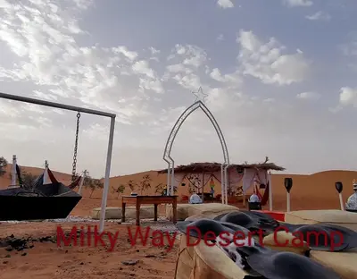 a view of a tent in the middle of a desert at Milky Way Desert Camp in Merzouga