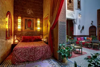 a bedroom with a bed in a room at Riad La Maison Verte in Fès
