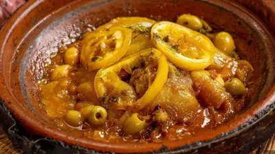 a bowl of food with yellow peppers and beans at Karim Sahara in Zagora