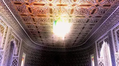 a room with a ceiling with a light on it at Riad Dar Zidane in Meknès