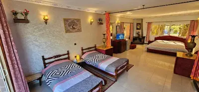 a bedroom with two beds in a room at Top Ourika in Aghbalou