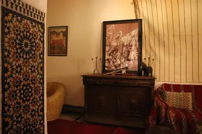 a room with a mirror and a dresser in a room at Dar Rbab in Fès