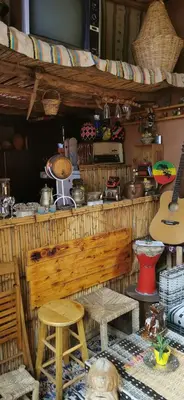 a kitchen with a counter with a lot of items at Atlas Room in Midelt