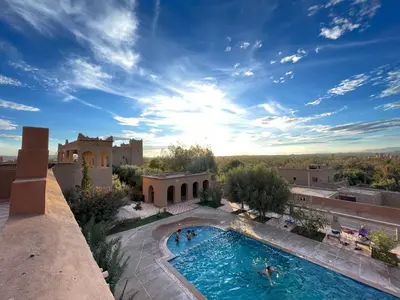 a view of a swimming pool on top of a building at Auberge Famille Benmoro in Skoura