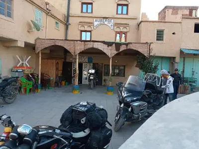 a group of motorcycles parked in front of a building at Auberge des lacs in Imilchil