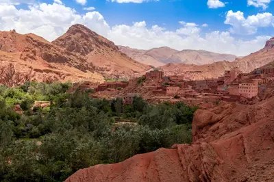 a view of a town in the mountains at Auberge Des Jardins du Dades in Boumalne
