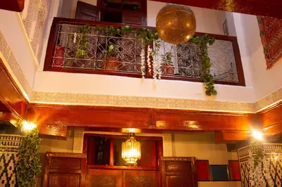 a building with a stained glass window above the door at Dar Lantana in Fès