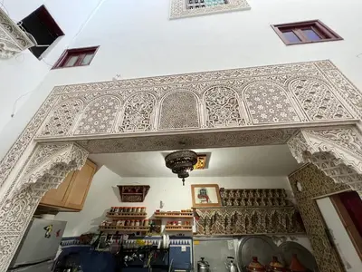 an ornate ceiling in a shop in a building at Dar Sunrise Fes in Fès