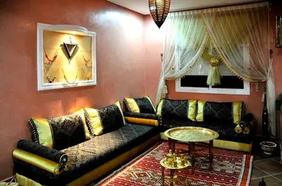 a living room with a couch and a table at Luxury Riad Saad Fes- Apart in Fès