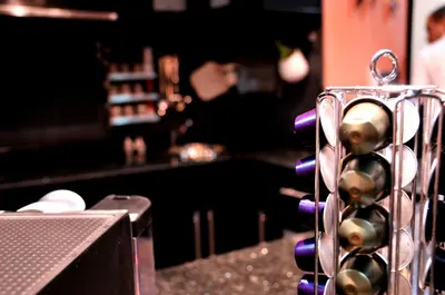 a bunch of wine bottles on the counter of a bar at Luxury Riad Saad Fes- Apart in Fès