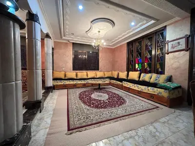 a living room with a couch and a rug at 