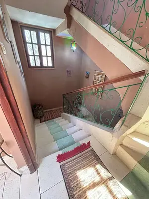 an overhead view of a staircase in a house at Dar Nakhla Zagora Guest House Restaurant & Desert Excursions in Zagora