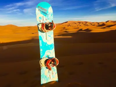 a snowboard in the middle of a desert at Sahara Happy Camp in Merzouga