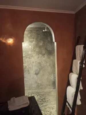 a hallway in a room with a wall at Dar Faracha Fes in Fès