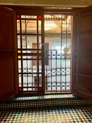 an open door with a view of a tile floor at Dar Attajalli in Fès
