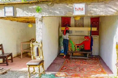 a couple of people standing in a room at ferme by Ikalimo in Ourika