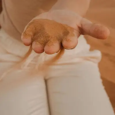 a person holding their hand on their pants at Erg Chigaga Camp Shooting Stars in Mhamid