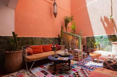 a living room with a couch and a table at Dar Soufian in Ouarzazate