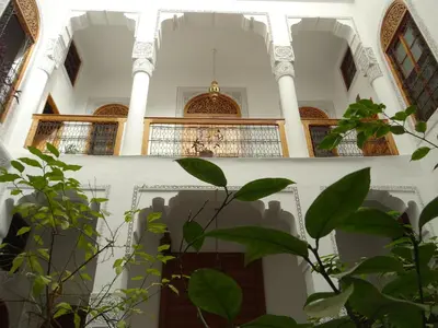 a view of the lobby of a building with plants at Dar Al Safadi in Fès