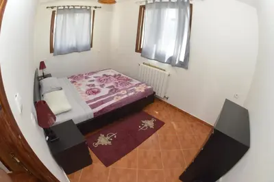 a small bedroom with a bed in a room at Villa SALAM in Ifrane