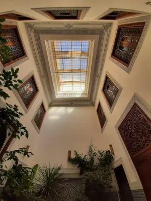 a ceiling with a skylight in a building at Dar Abdesalam in Fès