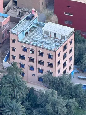 an overhead view of a large building with a roof at AUBERGE ROYAL PALMAS in Tinerhir
