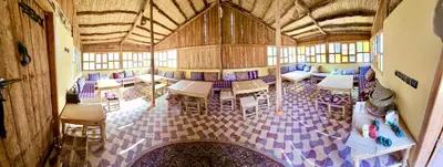 an overhead view of a room with tables and chairs at Camping auberge palmeraie d'amezrou in Zagora