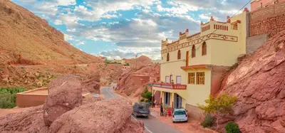a building on the side of a mountain at Auberge oued dades in Boumalne