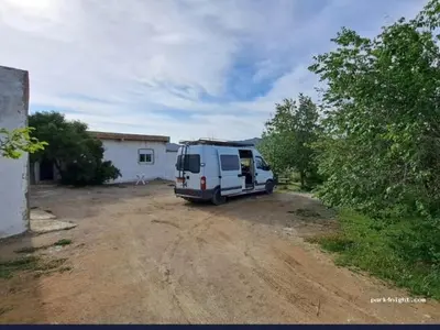 a camper van parked in a dirt road at Gîte Dayet Chiker in Taza