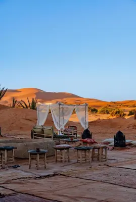a tent in the middle of the desert at Comfort Luxury Camp in Merzouga