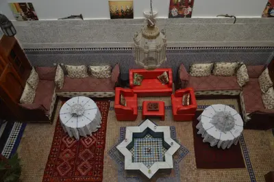 a model of a living room with a table and chairs at Riad Oumkaltoum Fès in Fès