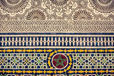 a close up of a rug with patterns on it at Dar Roumana in Fès