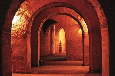 an alley way in a building with an archway at Riad Zidania in Meknès