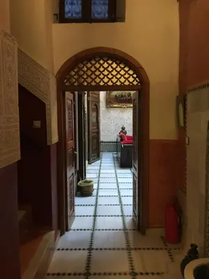 an entry way to a house with a tile floor at Riad AlKATIB Meknès in Meknès