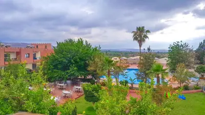 an aerial view of a resort with a swimming pool at Hôtel Relais Saiss in Sefrou
