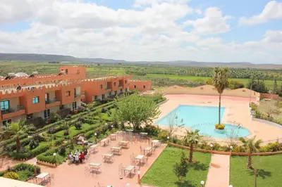 an aerial view of a resort with a swimming pool at Hôtel Relais Saiss in Sefrou