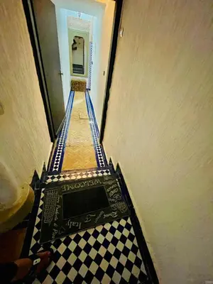a view of a hallway with a tile floor at Dar Jardin Majorelle Fez in Fès