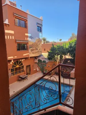 a view of a balcony of a building at La Rose De Sable in Aït Ben Haddou